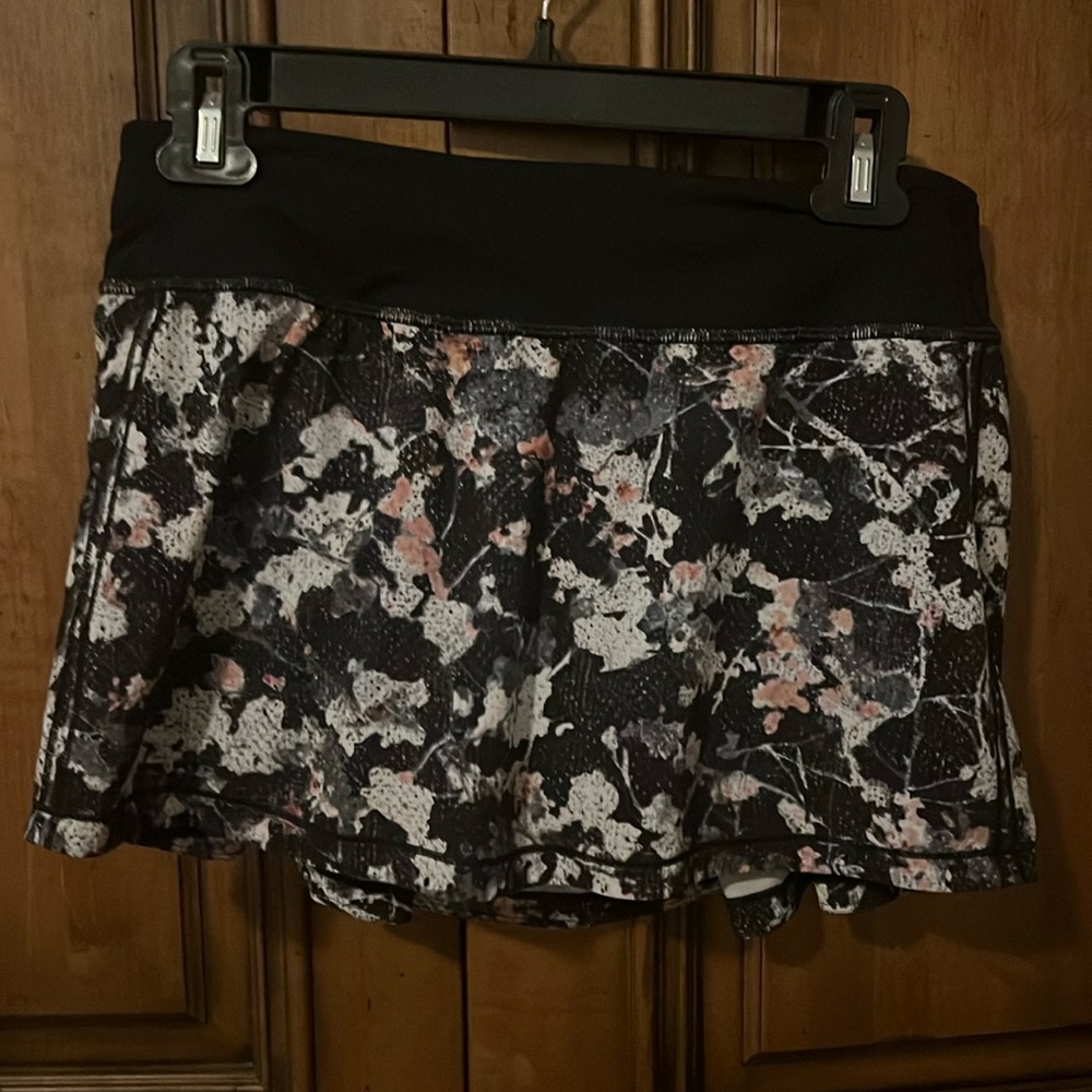Black floral Lululemon tennis skirt.